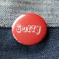 Preview: Ansteckbutton Sorry auf Jeans